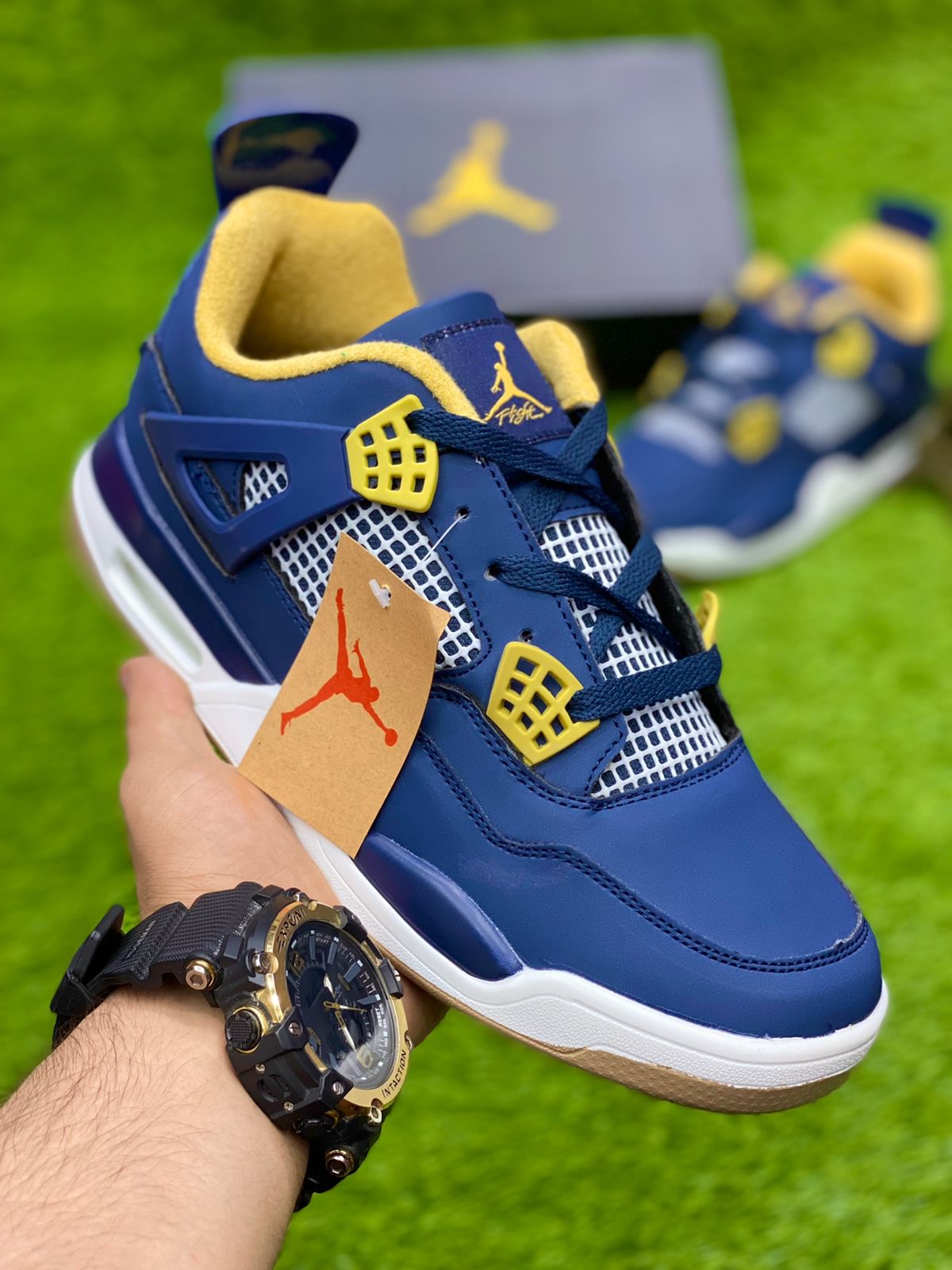 Jordan 4 cheap navy blue yellow