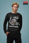 mockup-of-a-man-in-a-studio-wearing-a-rounded-neck-bella-canvas-long-sleeve-tee-m32756